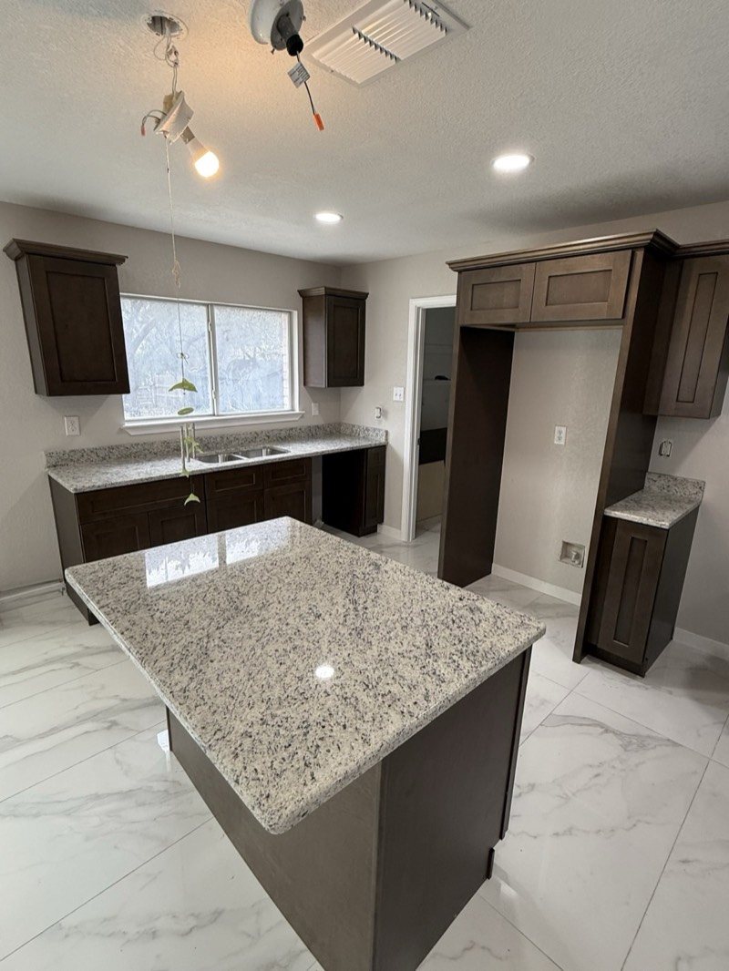 Espresso shaker kitchen cabinets with a window by MNK Cabinet in metro Atlanta