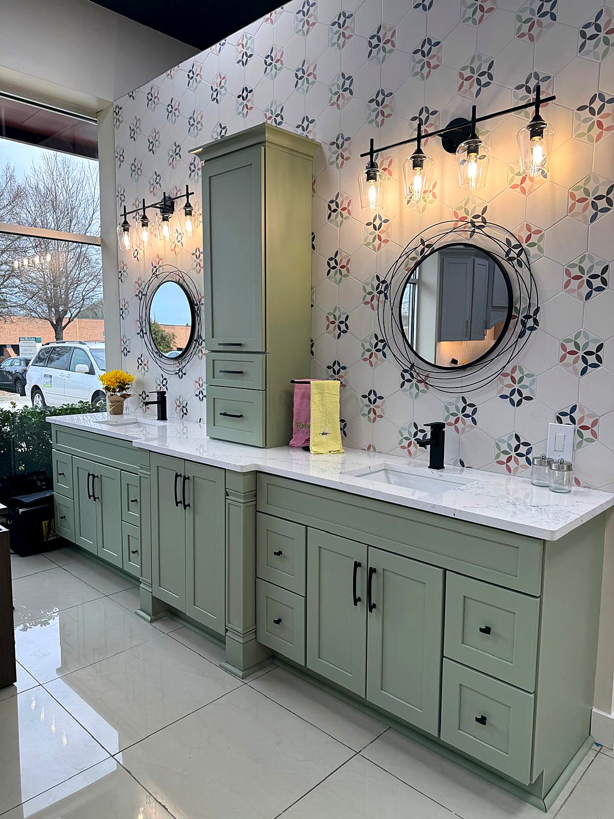 Sage green shaker double sink bathroom vanity from MNK Cabinet in a metro Atlanta bathroom
