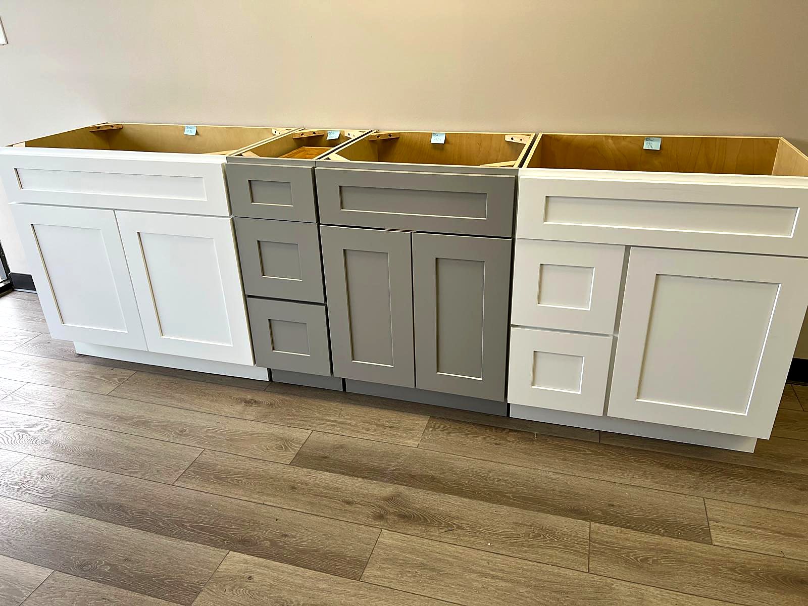 White and gray shaker vanity cabinets from MNK Cabinet in a remodeled metro Atlanta bathroom