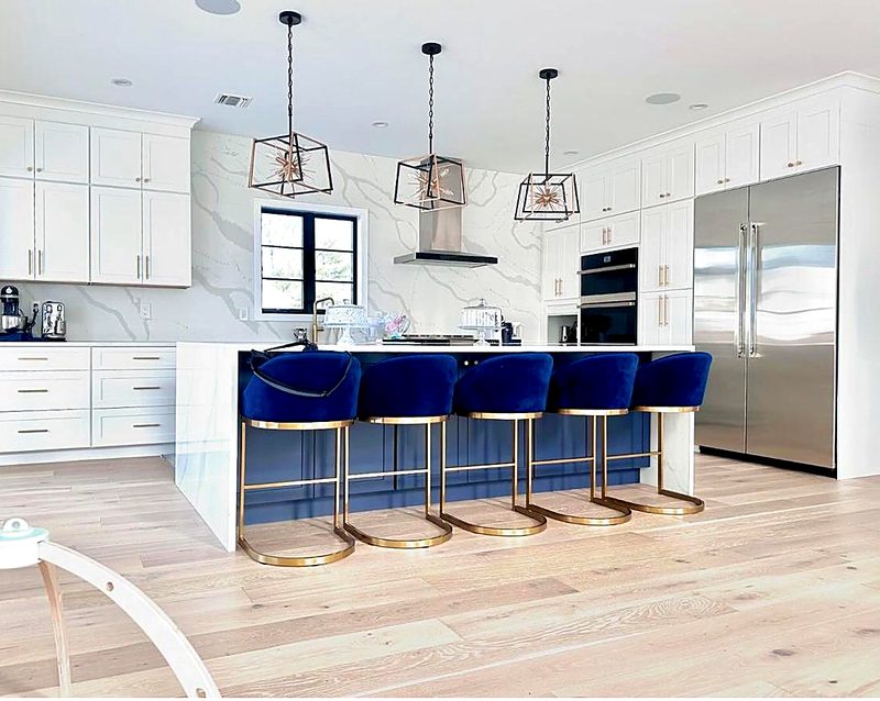Luxury white shaker kitchen with full-height calacatta quartz slab backsplash wall — kitchen by MNK Cabinet in metro Atlanta